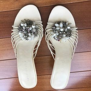 Cute cream colored 2” sandals.